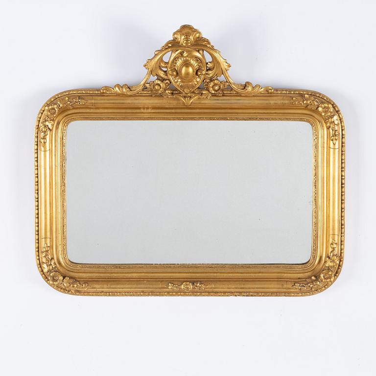A gesso rococo-revival mirror, later part of the 20th Century.