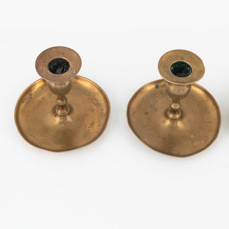 Four bronze candlesticks, a pair of which Skultuna model N 60, 18th-19th Century.