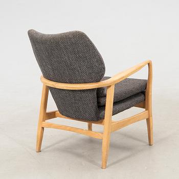 Armchair with armrests, modern manufacture.