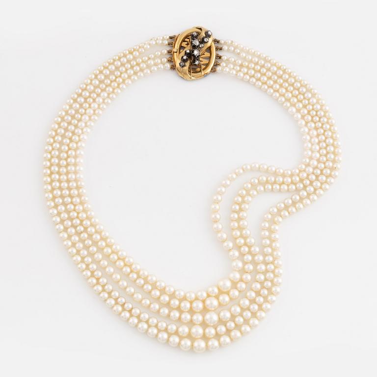 Five strand calibrated cultured pearl necklace, goldclasp with rose cut diamonds.