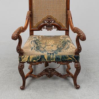 A 19th century baroque style armchair.