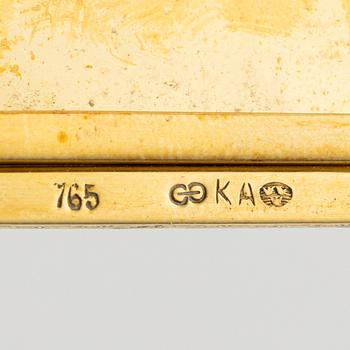 Travel photo album, 18K gold, with monogram.