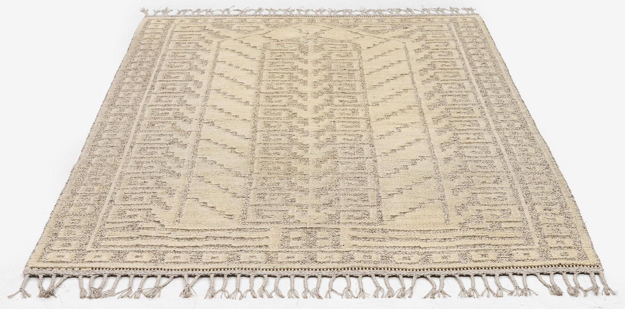 Märta Måås-Fjetterström, a 'Vita spetsporten' carpet, knotted pile in relief, c. 225 x 136 cm. signed AB MMF.