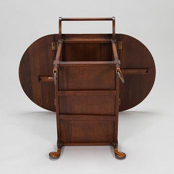 A drop-leaf tea trolley from the latter half of the 20th century.