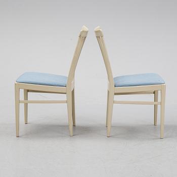 A dining table with six chairs by Carl Malmsten, second half of the 20th Century.