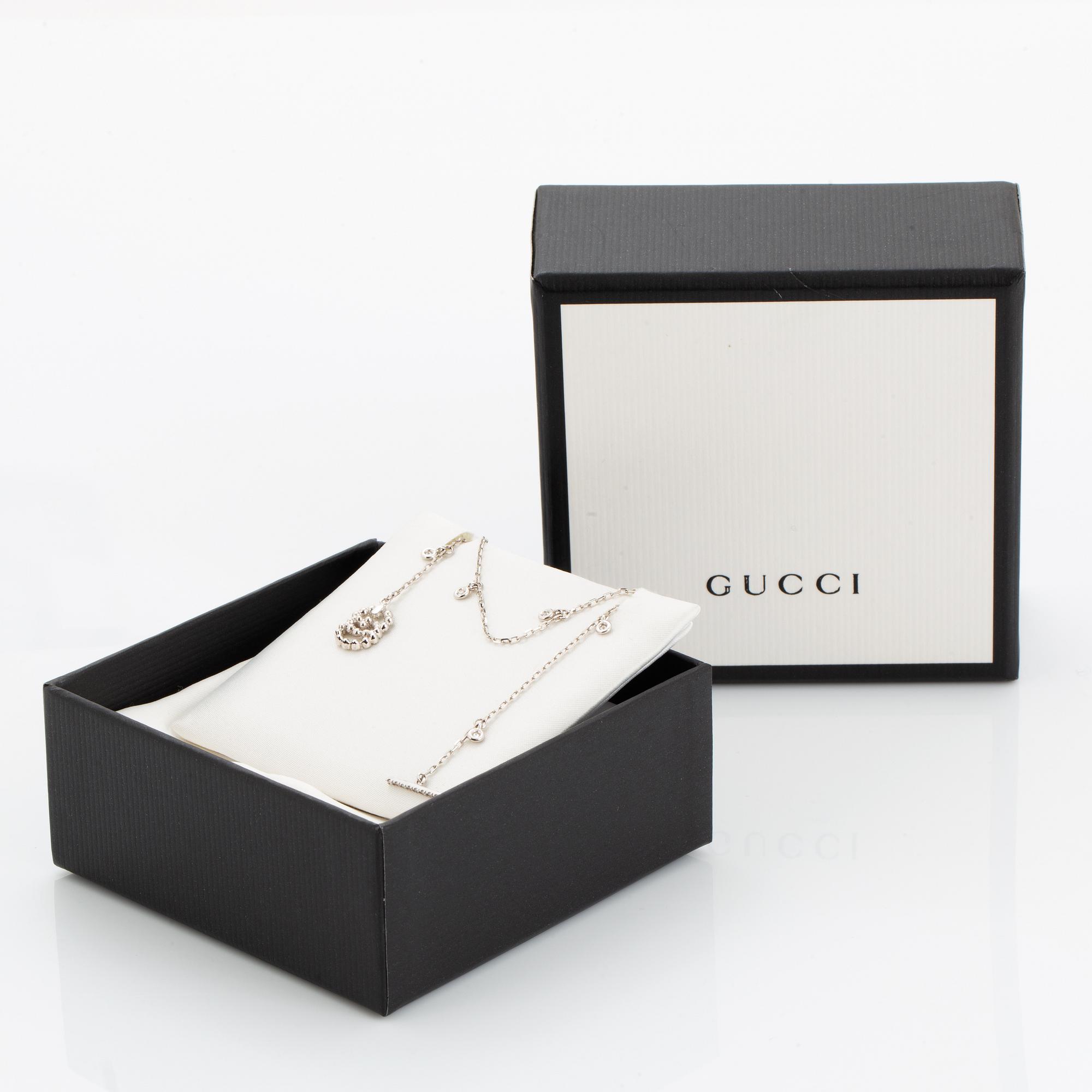 Gucci bracelet set with brilliant-cut diamonds.