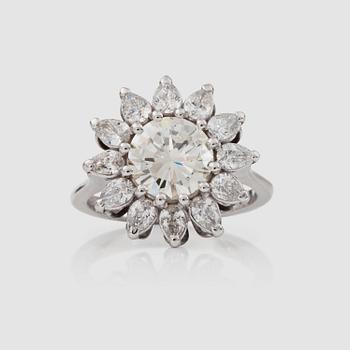 RING with a 2.27 ct center stone brilliant-cut diamond and pear-shaped diamond total carat weight 1.20 ct.