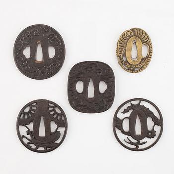 Five tsubas, iron and brass, Edo/Meiji period.