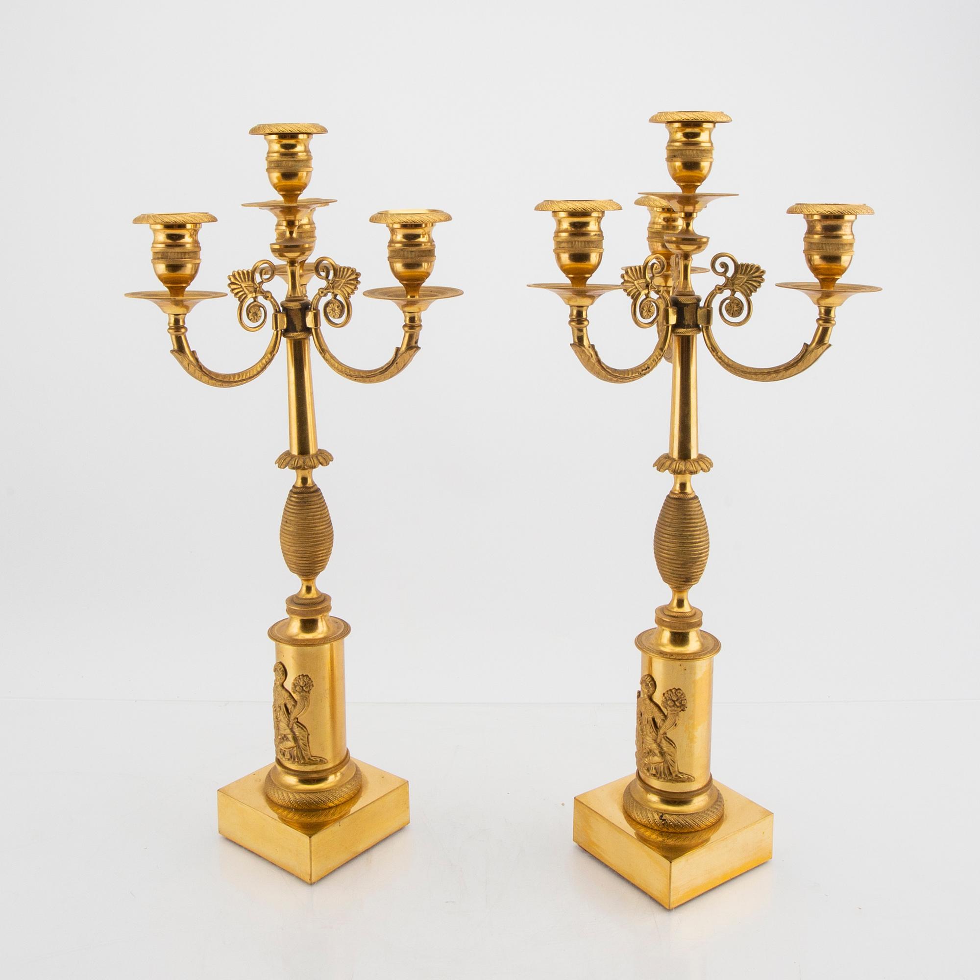 A pair of Empire style candelabras first half of the 20tyh century.