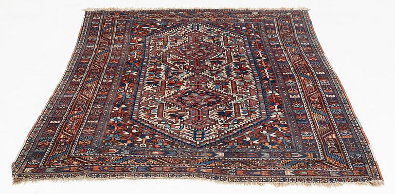 A carpet, Shiraz, circa 211 x 147 cm.