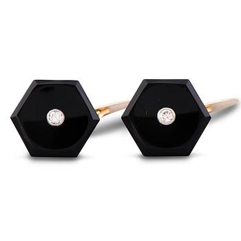 123. A PAIR OF CUFFLINKS, onyx, brilliant cut diamonds, 18K gold. Weckman A.R., Helsinki Finland 1936.