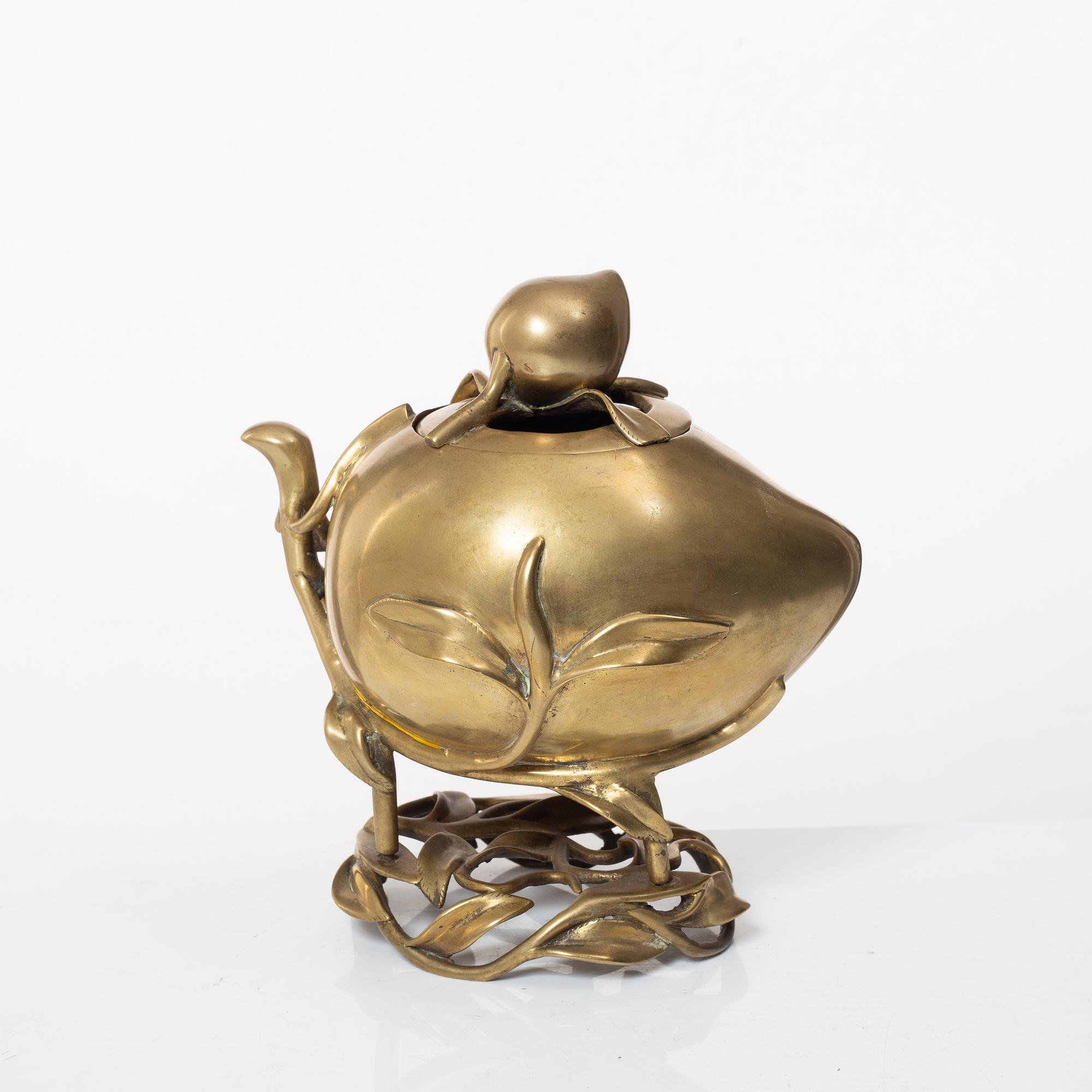 A Chinese brass 'peach' censer, first part of of the 20th century.