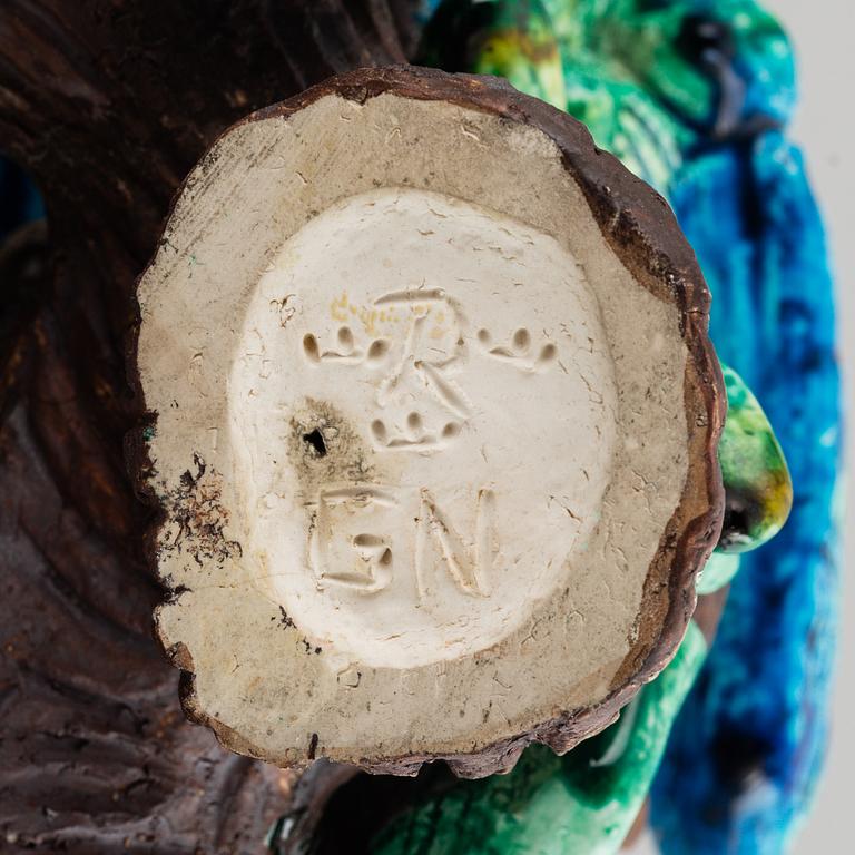 GUNNAR NYLUND, a stoneware figurine of a peacock, Rörstrand.