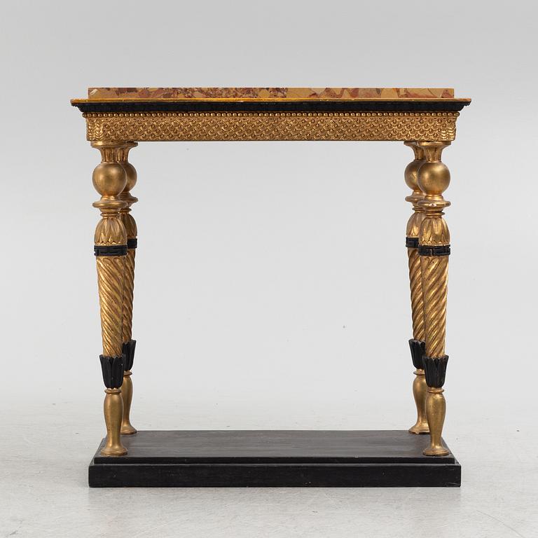 A late Gustavian giltwood, patinated and marble console attributed to J. Frisk (master in Stockholm 1805-24).