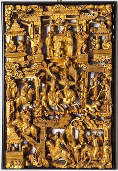 A carved and gilded Chinese panel, Qing dynasty, 19th Century.