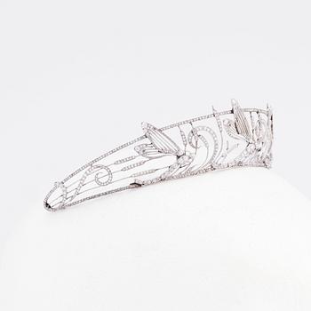 An important Boucheron dragonfly tiara, 1909, platinum set with diamonds.