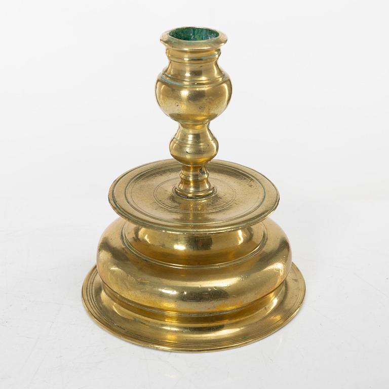 A Northern European baroque brass candlestick, late 17th century.