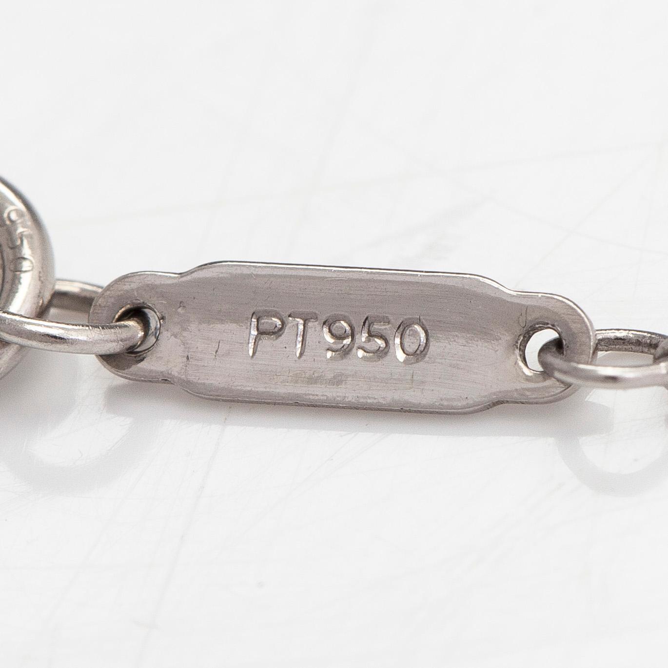 Tiffany & Co, a platinum necklace, 'Jazz Cross' with diamonds approx 0.20ct in total.