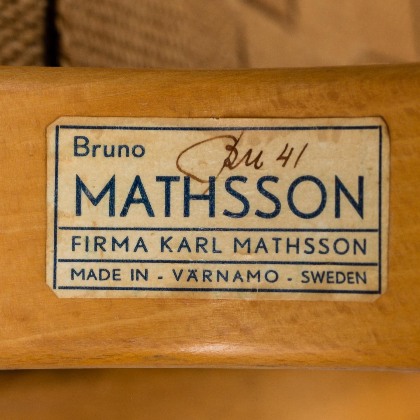 A armchair, model "Eva hög", designed by Bruno Mathsson for Firma Karl Mathsson, dated 1941.