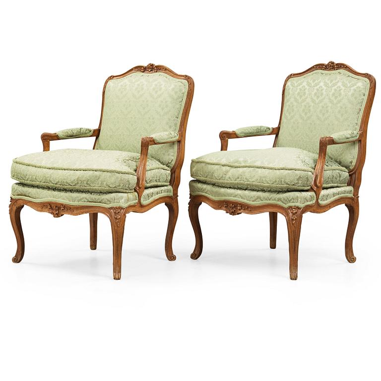 A pair of Louis XV 18th century armchairs.