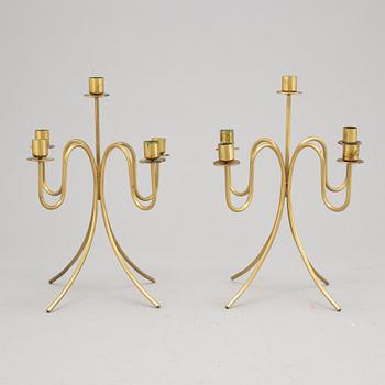 Gunnar Ander, a pair of five-light brass candelabra from Ystad Metall.
