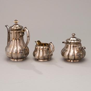 A 3-piece Russian silver coffee set, marks of Sazikov, St Petersburg 1869-70.