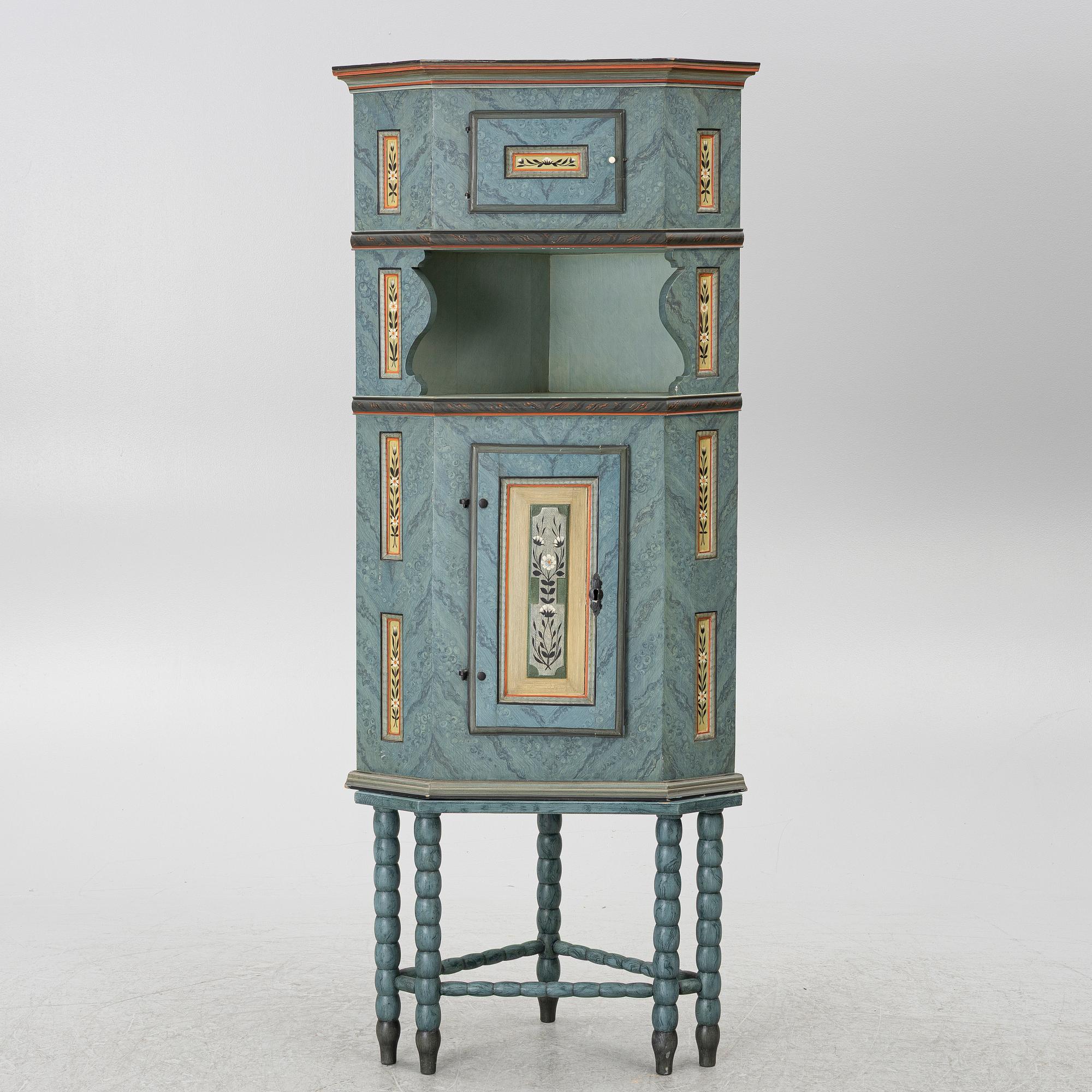 A corner cabinet, 20th century with older parts.