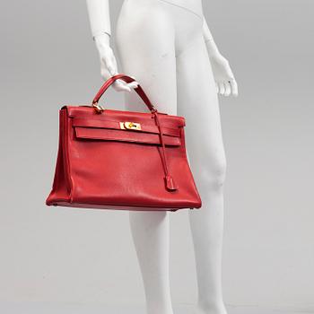 A red Epson "Kelly 40" bag by Hermès 1991.