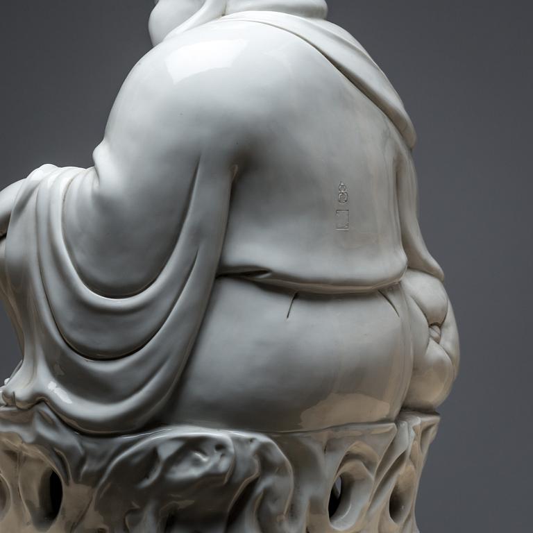 Laughing Buddha Blanc De Chine Porcelain Statue. 20th century.