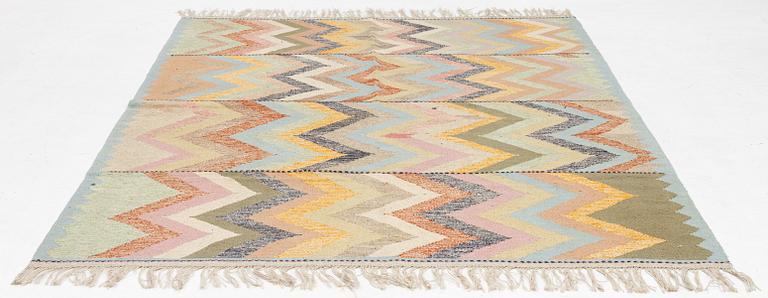 A Kilim rug, c. 257 x 182 cm.