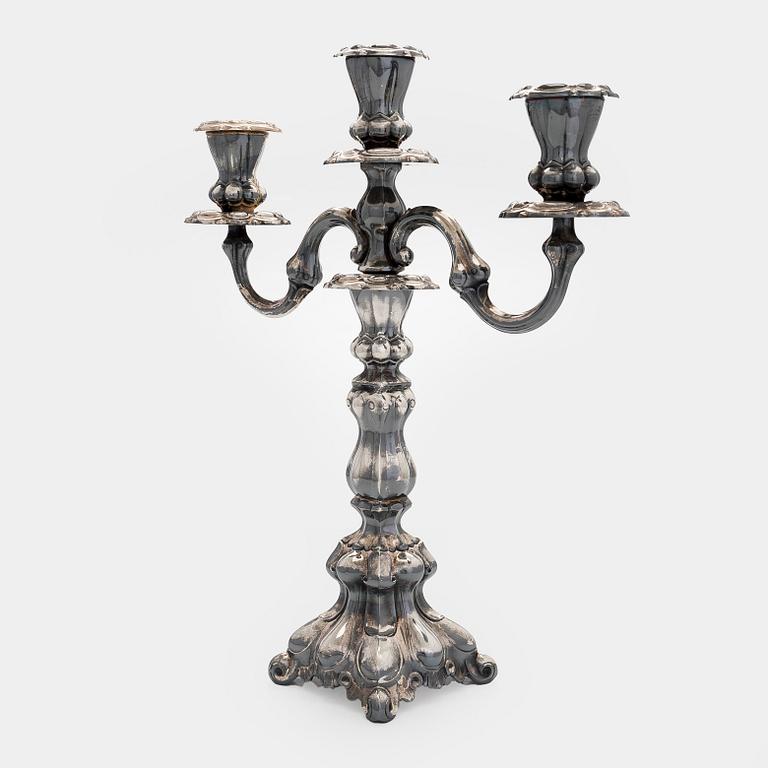 Kynttelikkö, hopea, Kultakeskus, Hämeenlinna 1990.