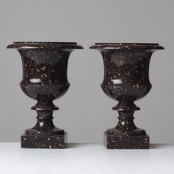 A pair if Swedish porphyry urns, early 19th century.