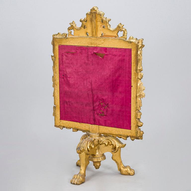 A Baroque style/Rococo revival brass protection, late 19th century.