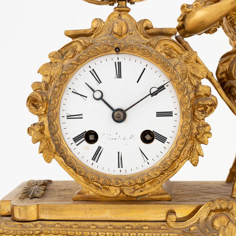 A French Rococo revival table clock, late 19th Century.