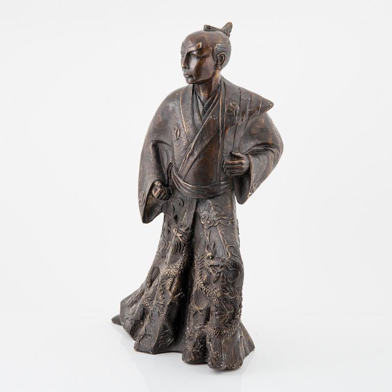 A large Japanese sculpture of a Samurai, 20th Century.