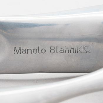 A metal shoe horn by Manolo Blahnik, 2000s.