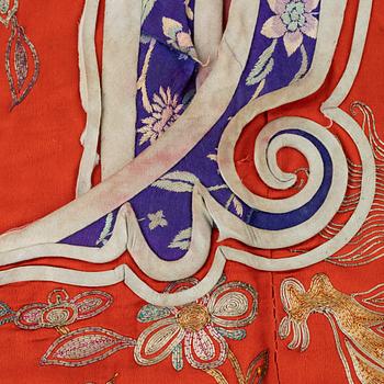 A Chinese embroidered silk jacket for children, late Qing dynasty, around 1900.