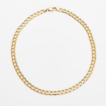 An 18K gold necklace. Unoaerre, Italy.