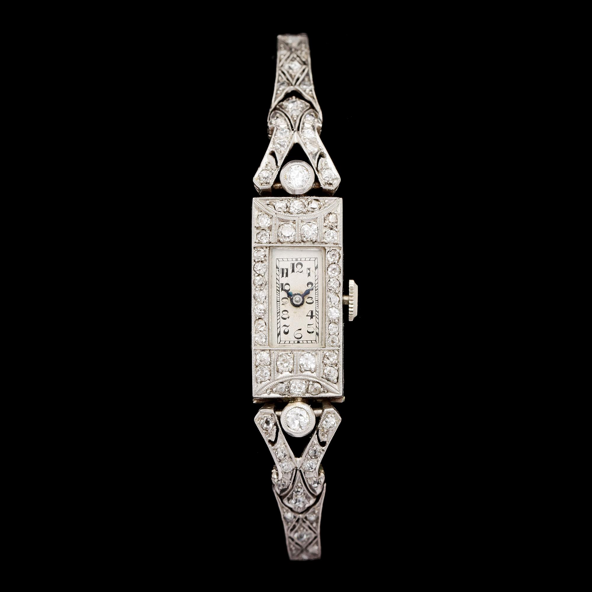 LADIE'S WRIST WATCH, brilliant- and eight cut diamonds, tot. app. 1.20 cts, c. 1920.