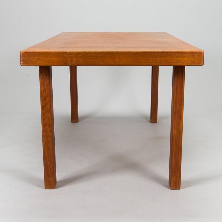 Carl Gustaf Hiort af Ornäs, a mid-20th Century dining table and eight chairs for  för HMN Huonekalu Mikko Nupponen.