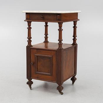 An early 20th century bedside table.