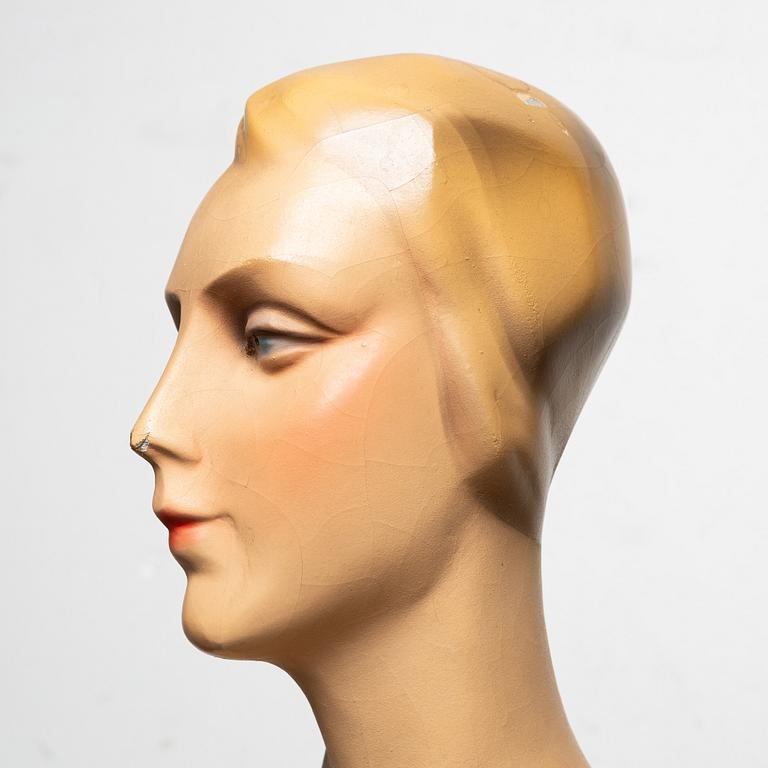 A 1930's storefront mannequin.