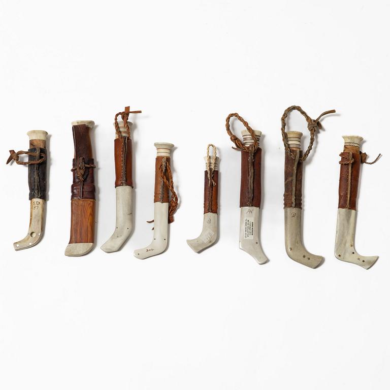 Eight knives, of which seven are half-horn knives, signed.