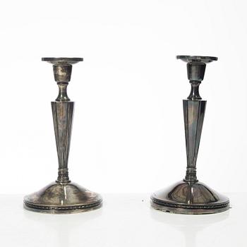 Four pairs och Swedish silver candlesticks, 19th-20th century.