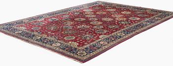 A fine Meshed carpet of 'Vase' design, North-East Persia, c. 480 x 345 cm.