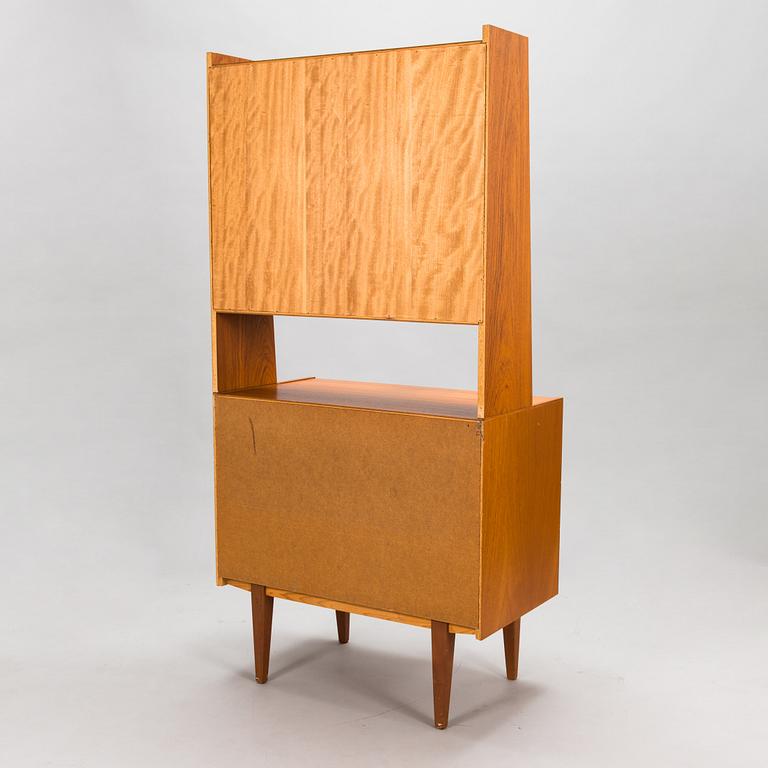 A mid-20th century bookshelf.