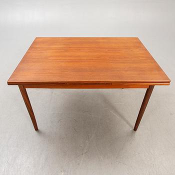 A Danish 1960s teak dining table.