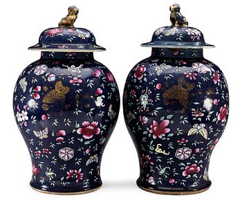 A pair of powderblue Chinese jars with covers, 18th cent.