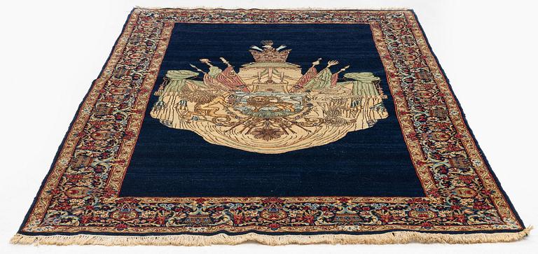 A semi-antique pictoral 'Lion and Sun' Kerman rug, c. 243 x 144 cm.