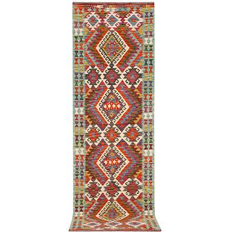 An Afghan kilim runner, c. 294 x 82 cm.